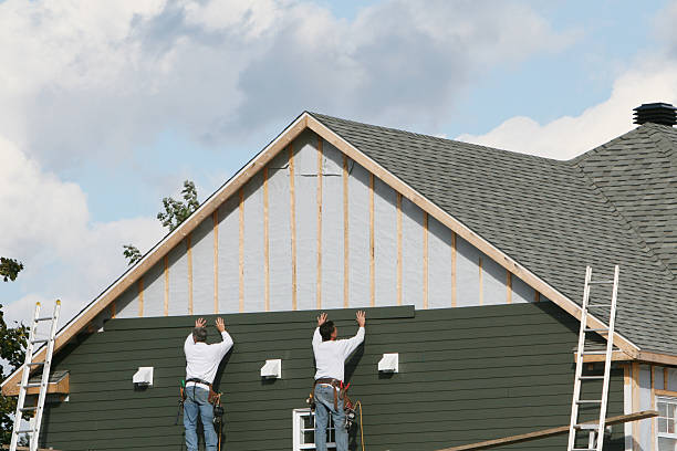 Professional Siding Contractor technician working in Medford, MA
